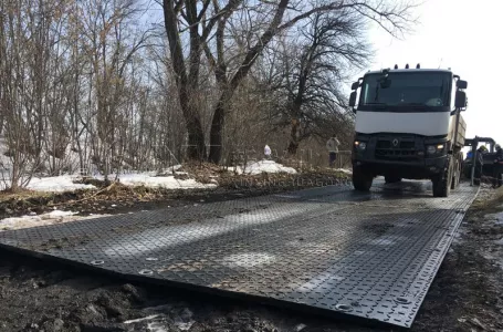 Heavy duty construction road panel